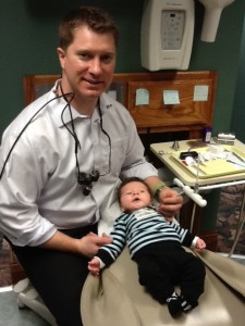 Dr. Nick Koenigsknecht with patient in the dental chair